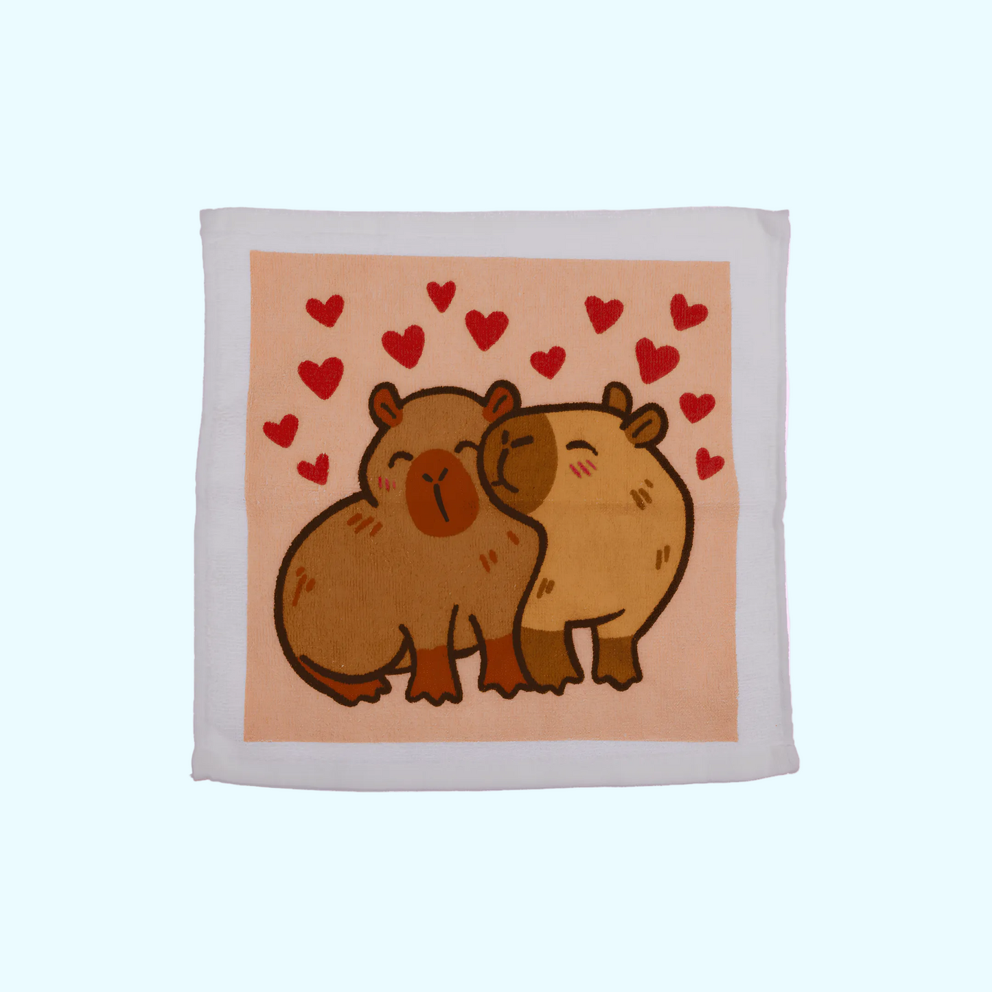 Capybara - Magisches Baumwollhandtuch 30x30cm - Capybara mit Herzen - SNACKS24.AT